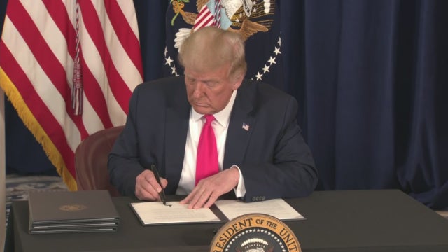 trump-signing-executive-orders.jpg 