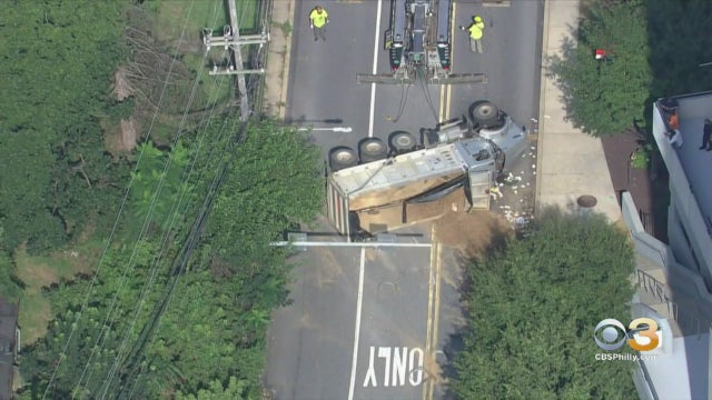 qdump-truck-overturns-.jpg 