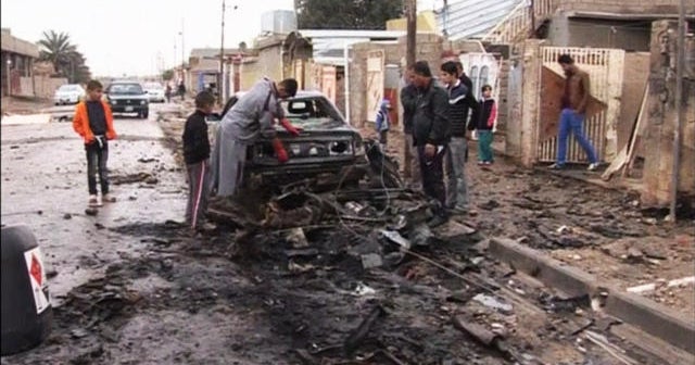 Iraqis, praying for peace, are once again bracing for war - CBS News