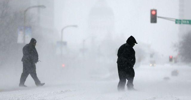 1/6: Dangerous cold grips the Midwest; Photographer conquers waves with ...