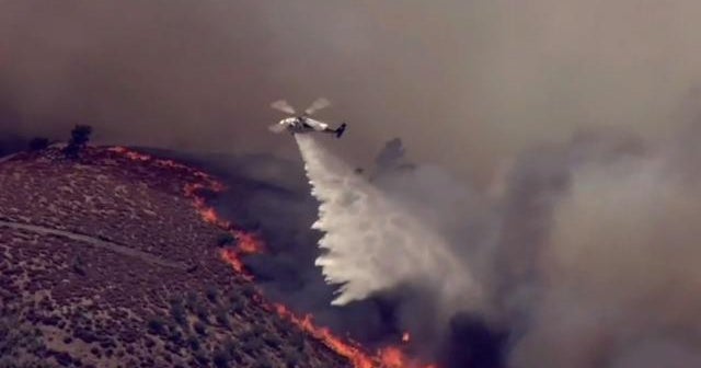 Record-breaking heat wave fueling wildfires in the West - CBS News