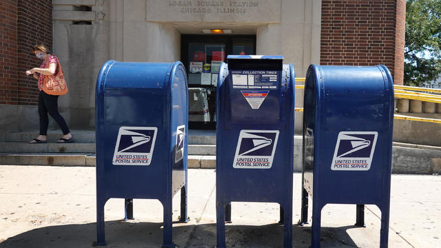US Postal Service Funding In Question As President Trump Threatens To Withheld In Budget Negotiations 