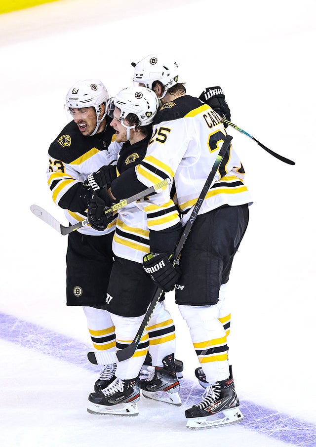 Brad Marchand, Torey Krug, Brandon Carlo 