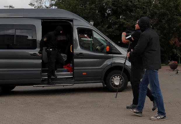 Law enforcement officers detain a journalist in Minsk 