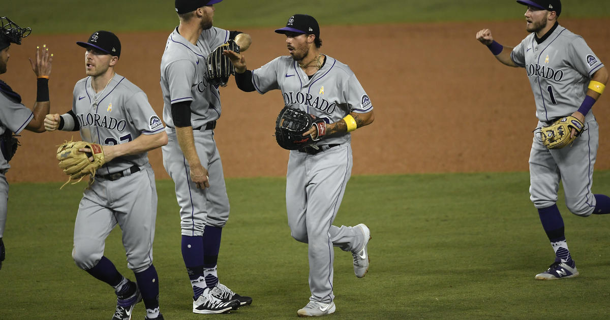 Kid goes nuts when he sees Charlie Blackmon on TV