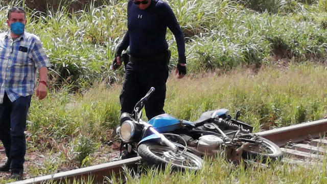 A motorcycle is seen at the site where the body of journalist Julio Valdivia was found in Tezonapa 