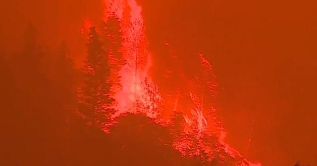 Death toll rises from raging wildfires in the West - CBS News