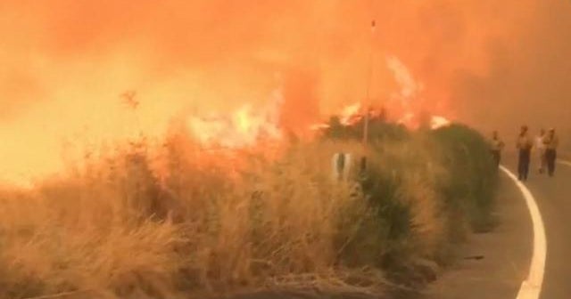 At least 19 people dead, dozens missing in wildfires - CBS News