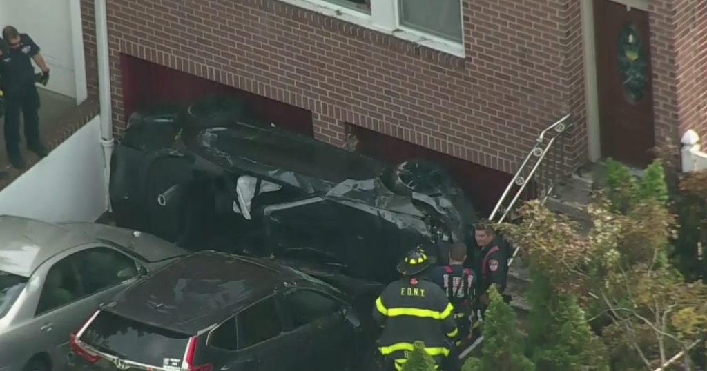 Police: Driver Fled Scene After Car Landed In Queens Driveway - CBS New ...