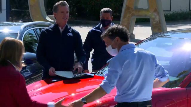 newsom-signing-car-ban.jpg 