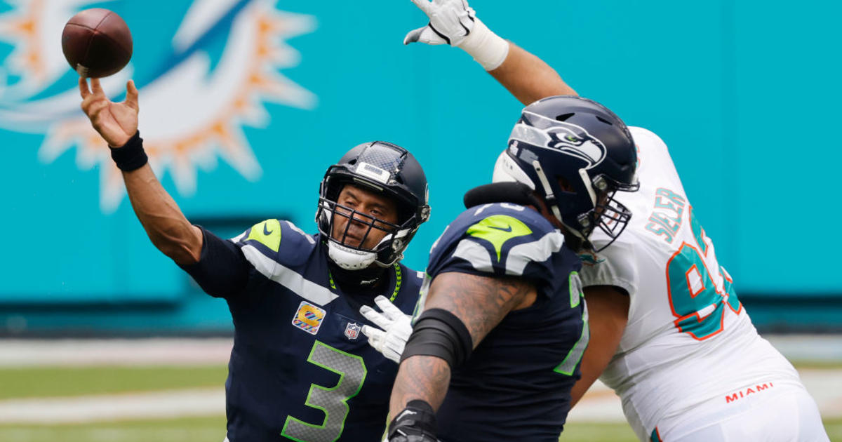 DK Metcalf of the Seattle Seahawks catches the ball over Shaquill News  Photo - Getty Images