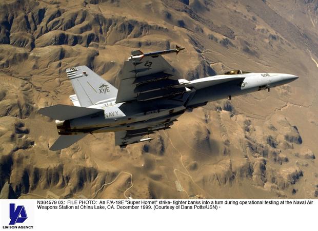 An F/A 18E Super Hornet Strike Fighter Banks Into A Turn During Operation 
