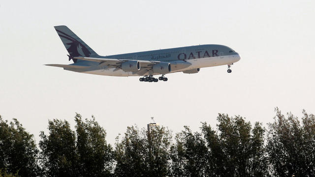 FILE PHOTO: Qatar Airways Airbus A380 plane is seen over Doha 