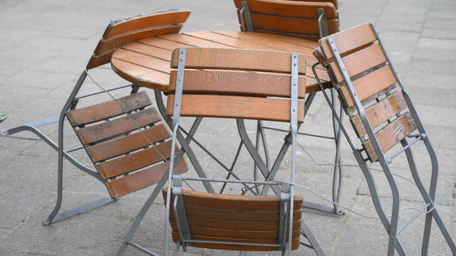 Chairs collected from a closed bar terrace during coronavirus time. Berlin. Germany. 