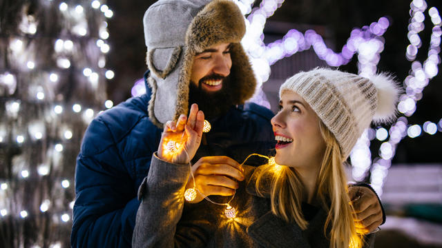 GettyImages-couple-holiday-lights-1132481345.jpg 