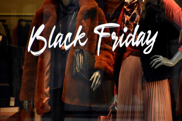 A Black Friday sign on a shop window at Rue Paradis in 