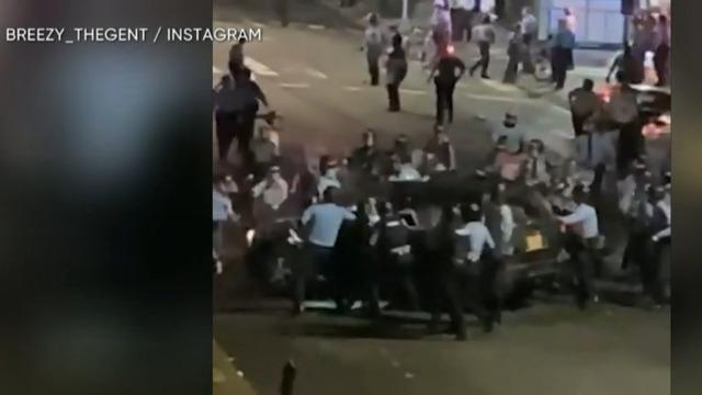 cbsn-fusion-philadelphia-family-ripped-from-vehicle-by-police-during-protest-thumbnail-602526-640x360.jpg 