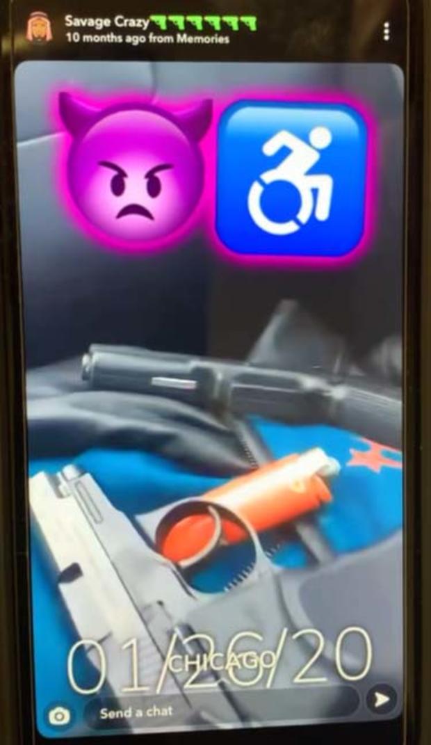 Johnson social media posting showing two handguns 