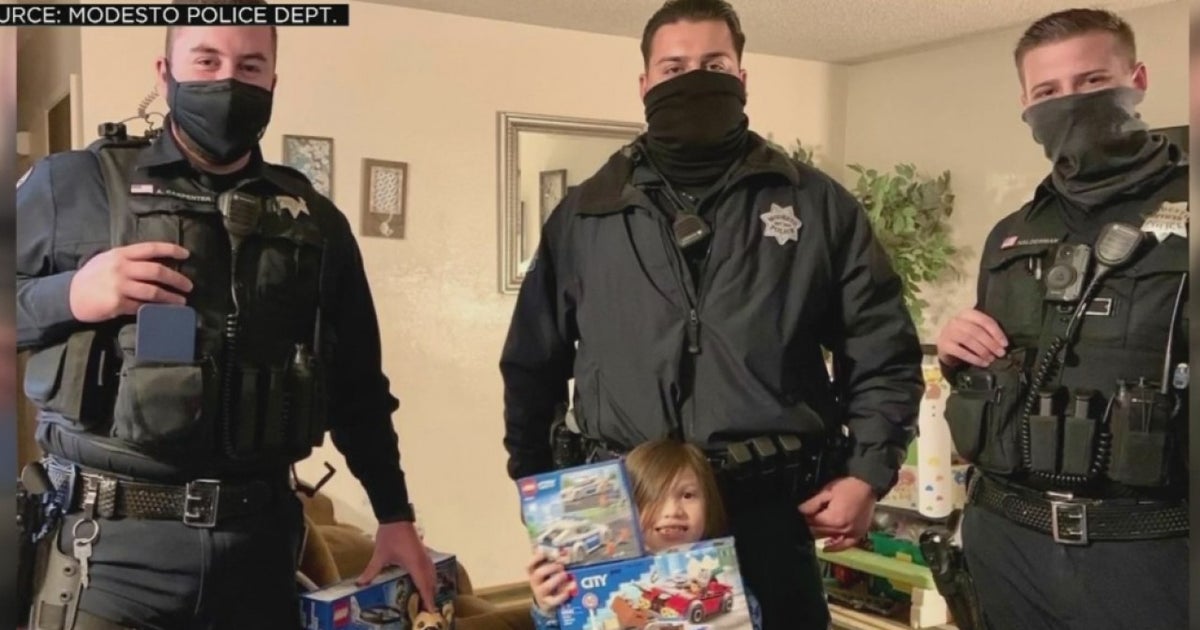 Modesto Police Officers Help Family Whose Car And Christmas Gifts Were