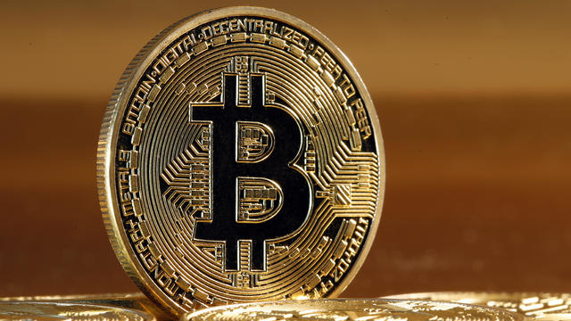 Novelty Coins Representing The Bitcoin Cryptocurrency : Illustration 