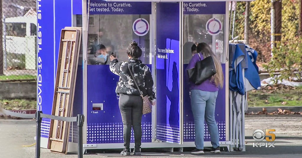 Temporary Bother or New Normal? Opinions Vary at COVID Test Site in