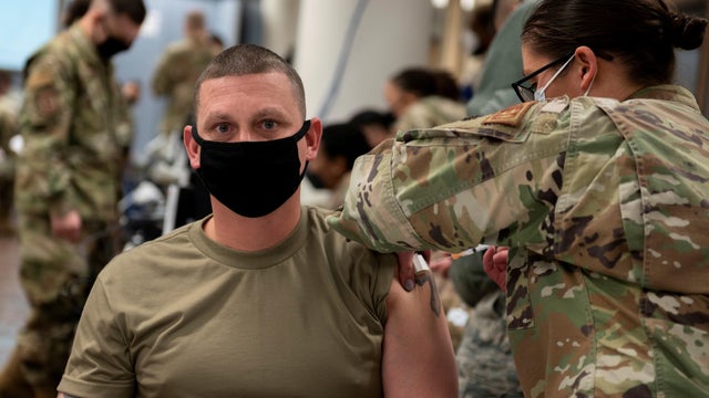 A U.S. Air Force soldier gets a coronavirus disease (COVID-19) vaccine at Osan Air Base in Pyeongtaek 