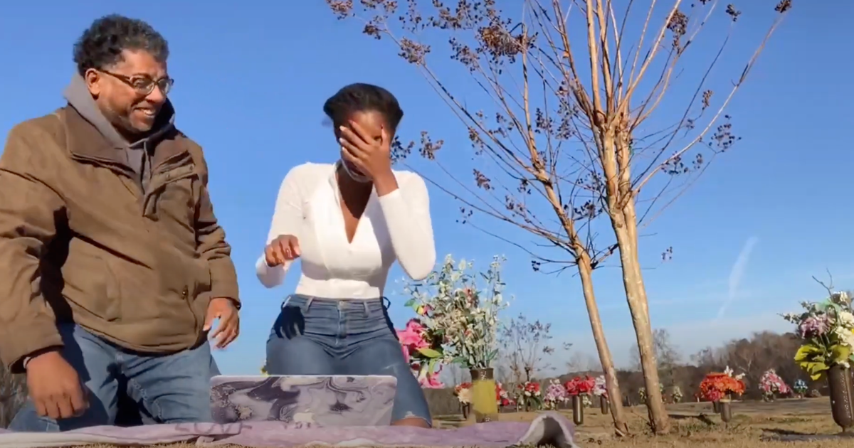 Video shows high school senior opening duke university acceptance at mother's gravesite