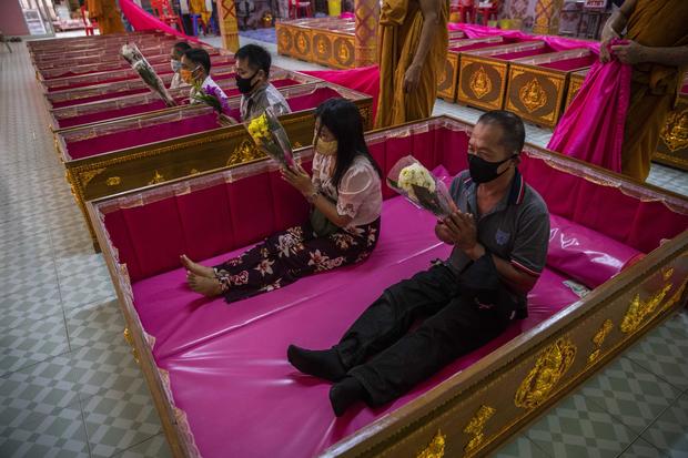 Thai People Lie In Coffins To Welcome The New Year 