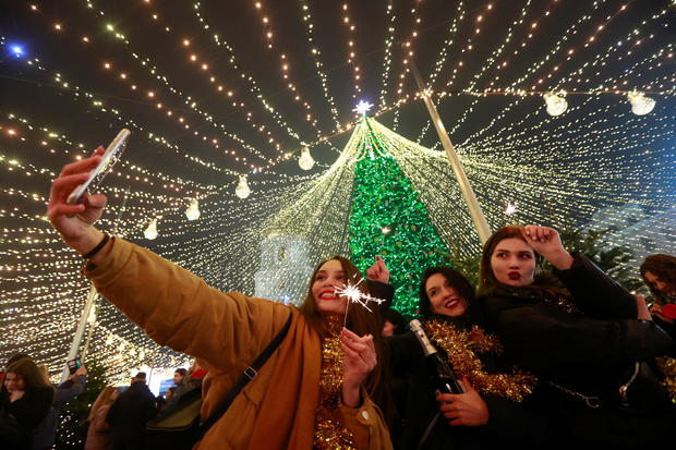 Revellers take part in New Year's Eve celebrations in Kyiv 