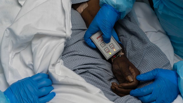 Hospital Workers Cope With Coronavirus Surge In Final Days Of 2020 