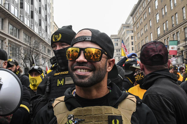 Enrique Tarrio, leader of the Proud Boys, stands outside Harry's Bar during a protest on Dec. 12, 2020, in Washington, D.C. 