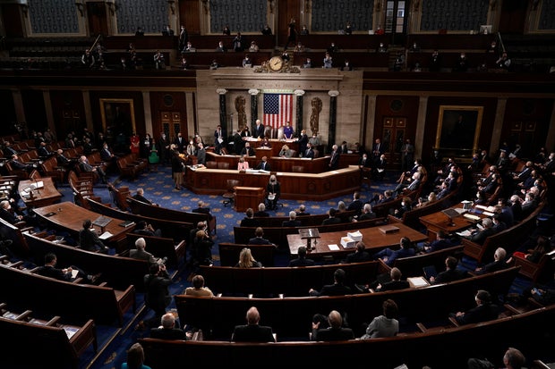 Speaker of the House Nancy Pelosi and Vice President Mike Pence officiate as a joint session of the House and Senate convenes to confirm Electoral College votes on Wednesday, Jan. 6, 2021.