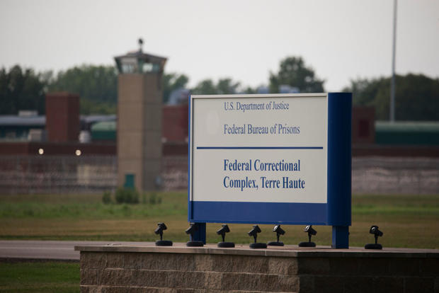 View of a sign outside the Terre Haute Federal Correctional 