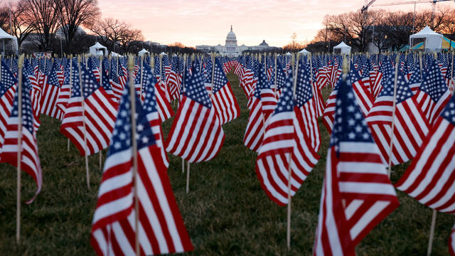 Thousands of U.S. flags are seen at the National Mall as part of a memorial paying tribute to people across the country who have died from the coronavirus, near the U.S. Capitol ahead of President-elect Joe Biden's inauguration, in Washington, January 18, 