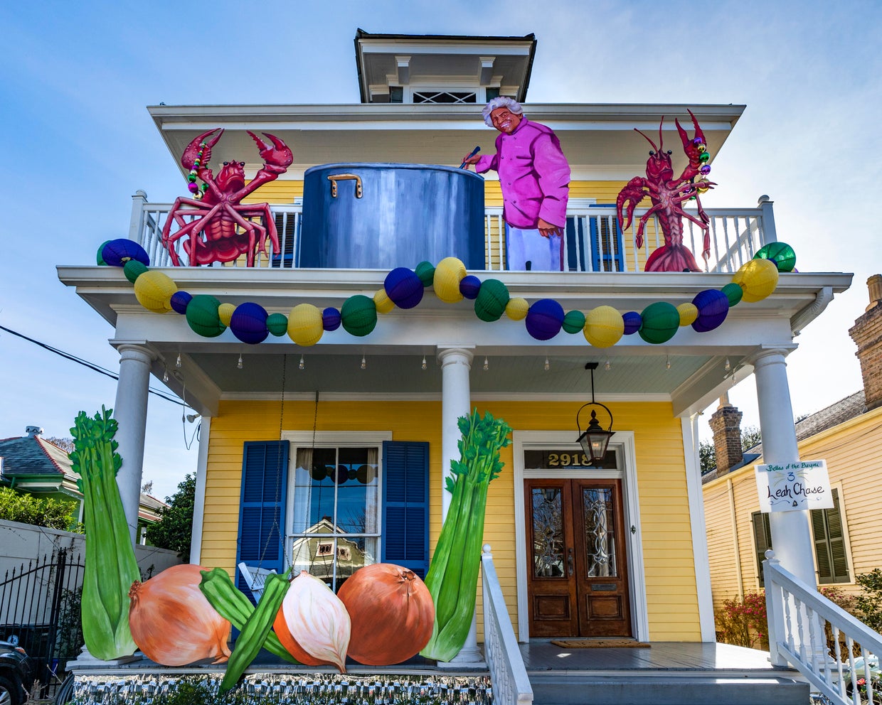 Houses in New Orleans are transformed into Mardi Gras floats since