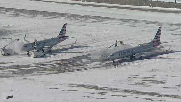 Planes de-iced at DFW Airport 