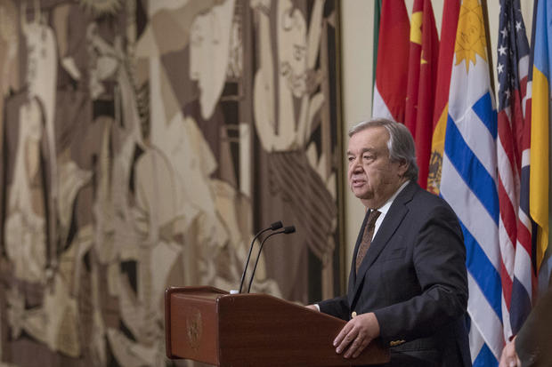 United Nations Secretary-General Antonio Guterres speaks at U.N headquarters in New York in front of the tapestry reproduction of Picasso's anti-war mural "Guernica," 