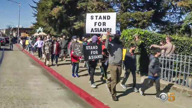 asia-viol-marchers.jpg 