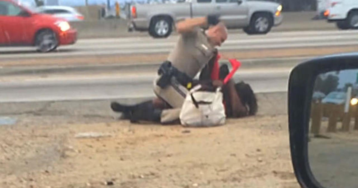 California Cop Beats Woman Repeatedly On The Freeway Cbs News 