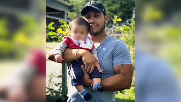 Jose Montes and child blurred 