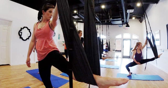Louisiana yoga class adds aerial movements CBS News