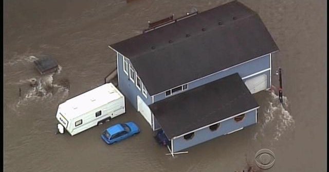 Heavy rain, flooding strikes West Coast - CBS News