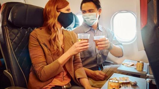 dal-cheers-tiptop-masks-onboard.jpg 