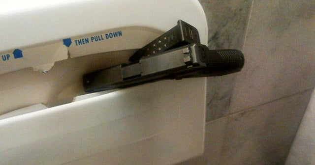 Gun found in Capitol toilet stall - CBS News