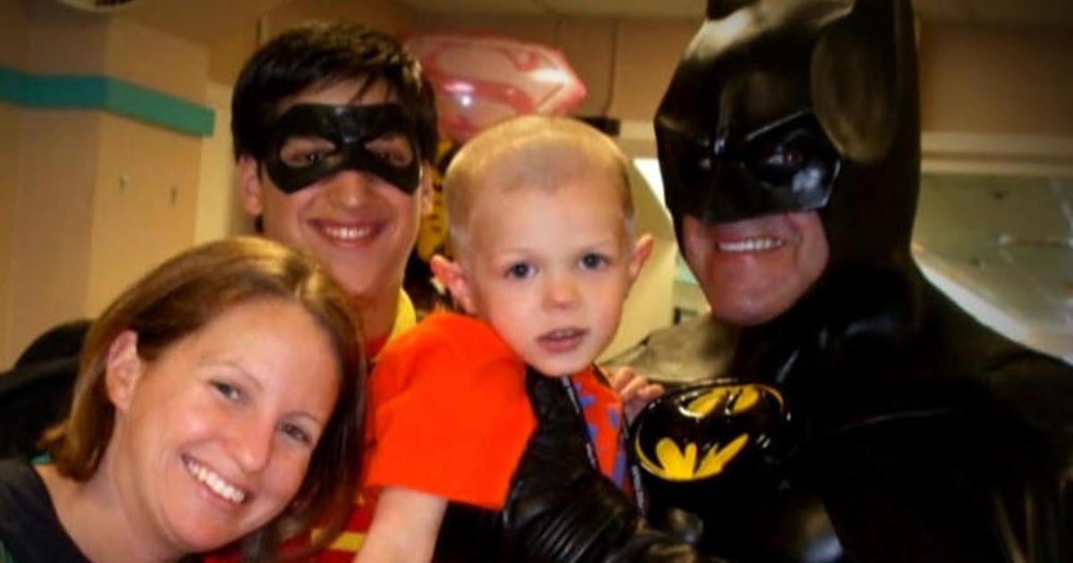 Man who posed as Batman for children remembered - CBS News