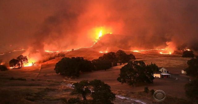 Wildfires and heat cause injuries across the West - CBS News
