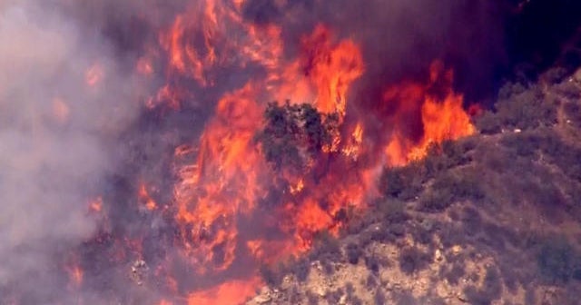 High heat and wildfires scorch west - CBS News