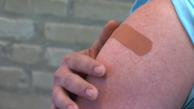 Vaccine-Shot-Generic-Band-Aid-On-Arm-Shot-In-Arm.jpg 