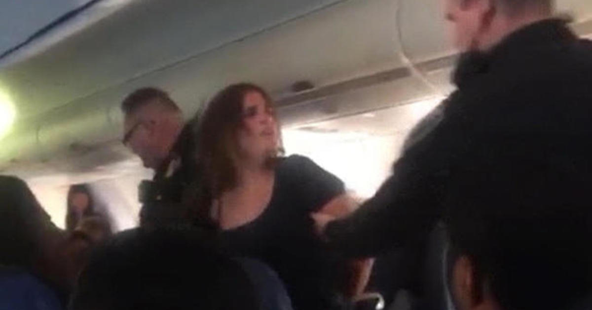 Woman Removed From American Airlines After Punching Flight Attendant Cbs News
