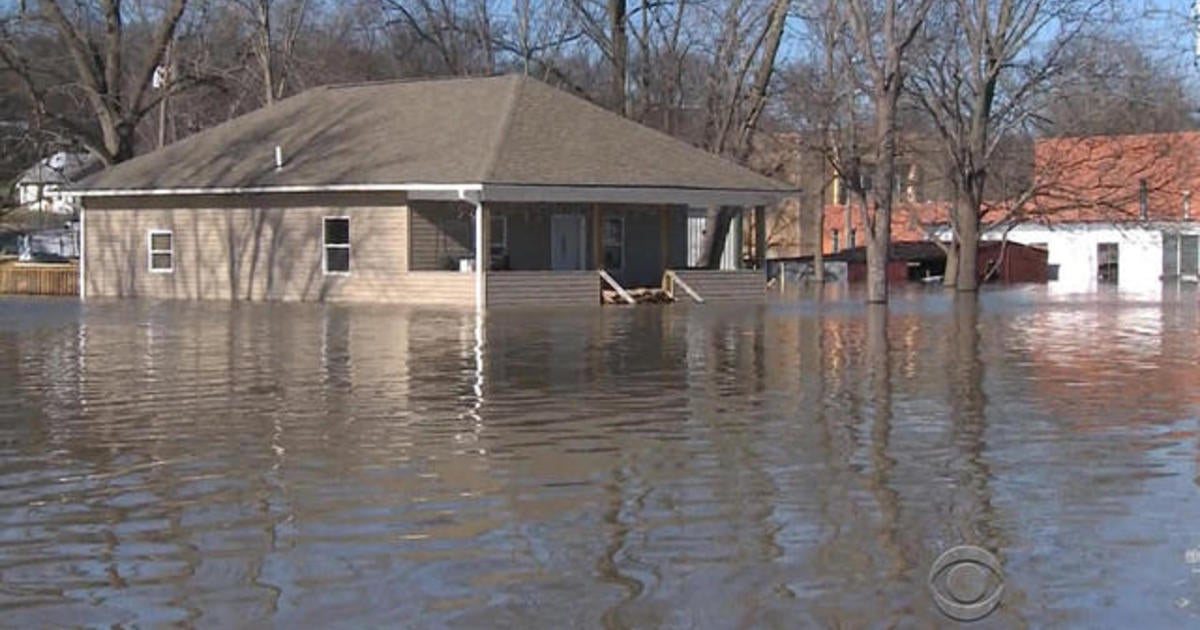 Millions face rising threat as Midwest floods move south - CBS News